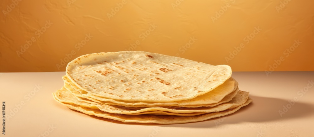 Aufkleber stack of corn tortillas on isolated pastel background copy space