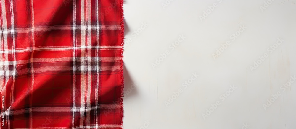Aufkleber top view of isolated pastel background copy space with red and white scotch pattern fabric and avail