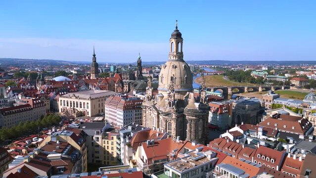 Lovely aerial top view flight 
Dresden city Women church Frauenkirche City town Germany, summer sunny blue sky day 23. ascending drone
4k cinematic footage