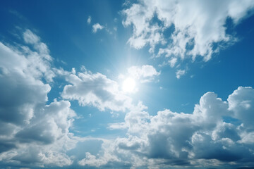 Naklejka na ściany i meble Blue sky background with tiny clouds and sun. Natural sky background.