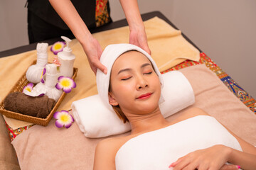 Relax asian woman, spa back massage and luxury wellness for zen therapy, beauty and rich skincare. Therapist muscle reflexology on salon bed, stress relief.