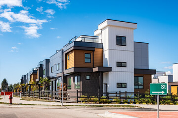New Modern Apartment Buildings in Vancouver BC. Canadian modern residential architecture. New townhouses on a sunny day - obrazy, fototapety, plakaty