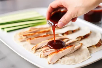 Printed kitchen splashbacks Beijing adding hoisin sauce on peking duck slices