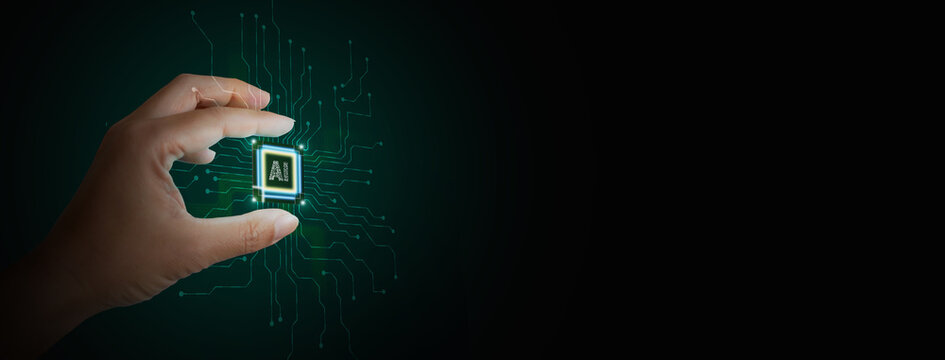 Computing power technology and performance concept. Super powerful CPU or microchip in the hand of a man, with word AI, artificial intelligence on it