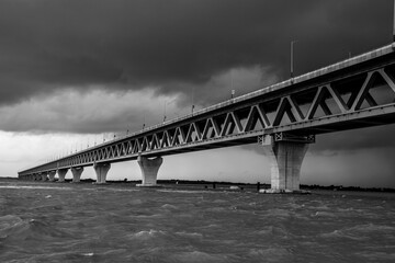 Most extensive Padma bridge photography under the dark cloudy sky