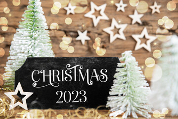 Christmas Trees, Rustic Holiday Background With Sign With Text Christmas 2023