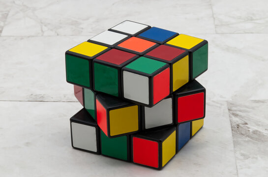 Bologna - Italy - October 4, 2023: Rubik's cube isolated on white background. Original vintage Rubik's cube from 70s.