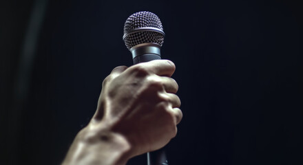 hands are holding microphone
