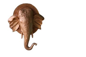 Head of the elephant on the wall. Wall decoration. Ganesha head. Hindu main God head. Green wall.