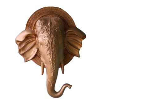 Head of the elephant on the wall. Wall decoration. Ganesha head. Hindu main God head. Green wall.