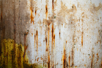 Rust of metals.Corrosive Rust on old iron with a hole. Rusted orange painted metal wall.