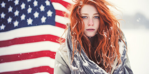 Touching image of a solitary woman draped in American flag braving cold snowfall. - obrazy, fototapety, plakaty