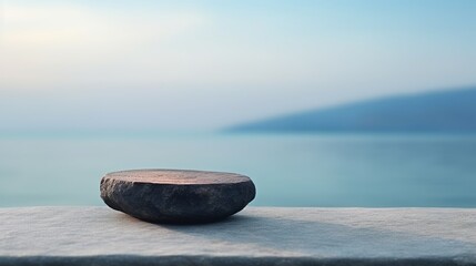 A mockup product display background featuring a stunning ocean backdrop. The product mockup is set on a dark, flat stone podium. - obrazy, fototapety, plakaty