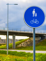 Circular shared cycling and walking sign of bike and pedestrian person walking.