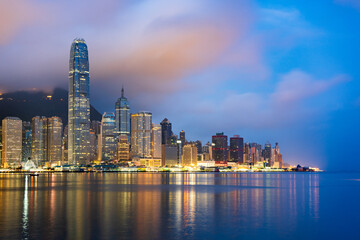 Aerial view of Hong Kong Central district and Victoria Harbour at twilight, China