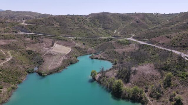 Aerial view looking down over Green lake turquoise water in the Taurus mountains of Turkey