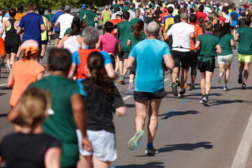 Runners on the street. Healthy lifestyle. Jogging exercise. Athletics