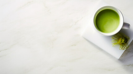Obraz na płótnie Canvas A minimalist setting: pure white backdrop, sleek modern mug, and the deep green hue of a matcha latte as the focal point.
