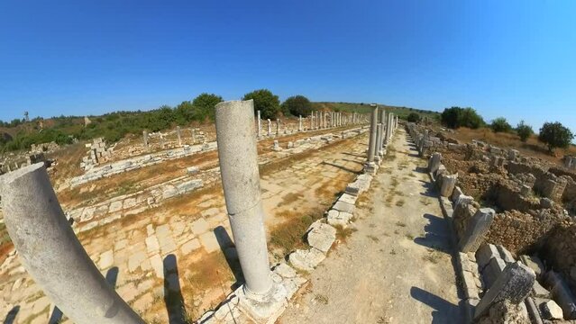 through the ruins of Perge Agora, profound connection to the past allowing travelers to envision dynamic energy of ancient marketplace and appreciate enduring legacy of Turkey's rich cultural heritage