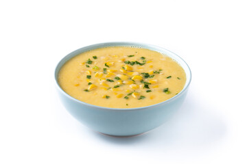 Corn soup in white bowl isolated on white background
