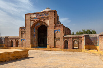 Fototapeta na wymiar Beautiful mughal era carved sandstone tomb of Isa Khan Tarkhan II in UNESCO listed Makli necropolis, Thatta, Sindh, Pakistan