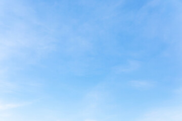 Naklejka na ściany i meble Fantastic soft white clouds against blue sky and copy space horizontal shape