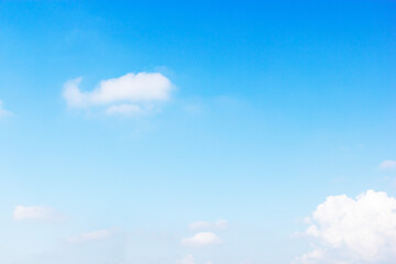 Blue sky background and white clouds soft focus, and copy space horizontal shape. - 657497460