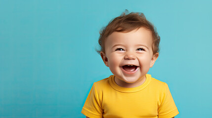 Happy baby on blue background - obrazy, fototapety, plakaty