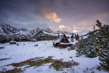 Winter sunset on Hala Gasienicowa in the Tatra Mountains, Poland. - obrazy, fototapety, plakaty
