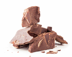 pieces of chocolate and crumbs for cooking and making fondue on a white background