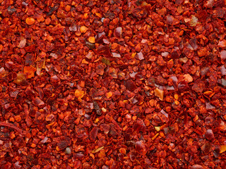 Crushed red pepper heap texture background