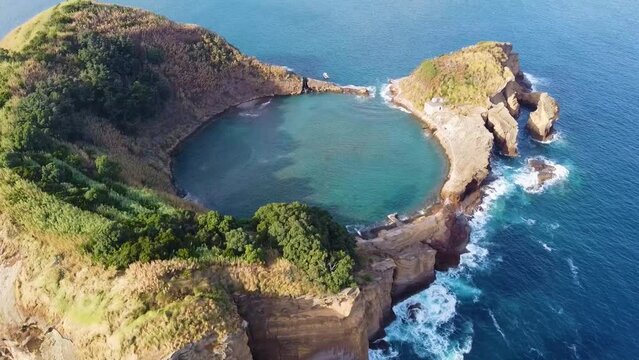 aerial view of an island with round beach atoll at the Azores, Ilh&eacute;u da Vila