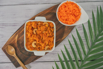 Gajar ka halwa is a carrot-based sweet dessert pudding from India. Garnished with Cashew/almond nuts.Gajar halwa, also known as gajorer halua, gajrela, gajar pak, and carrot halwa.