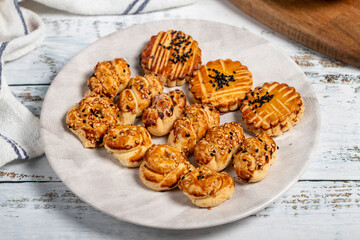 Salty Cookies. Freshly baked delicious cookies on a plate. Close up