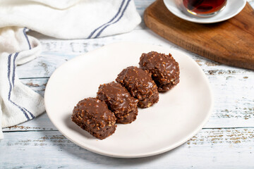 Chocolate cookie. Delicious cookies with chocolate and hazelnuts on a plate. Close up