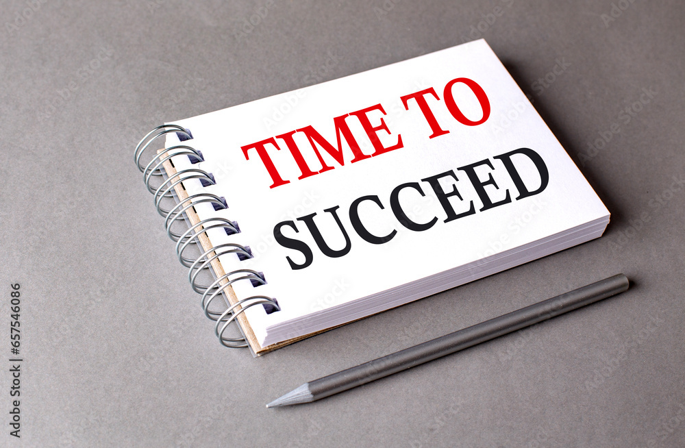 Poster time to succeed word on notebook on grey background