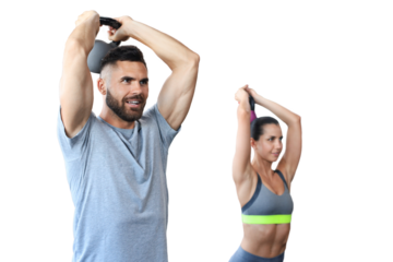 Fit and muscular couple focused on lifting a dumbbell during an exercise class on a transparent background
