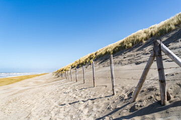 sand beach and dunes at north sea in the netherlands