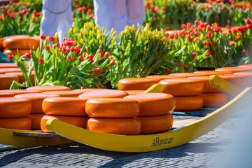Fotobehang alkmaar cheese market with cheese and tulips in holland © Denis Feldmann