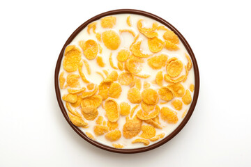 Cornflakes in a bowl with milk on a white background, top view - 657559628
