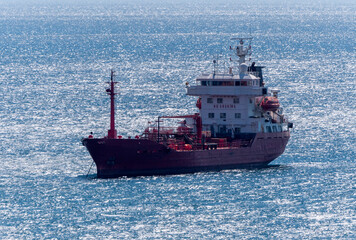 Large cargo ship in the Black Sea in the calm in Novorossiysk