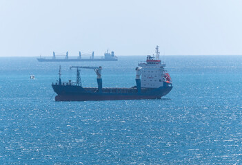 Large cargo ship in the Black Sea in the calm in Novorossiysk