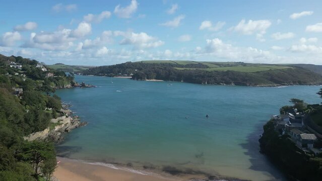 Salcombe Harbour, South Devon, England: DROVE VIEWS: South Sands beach, Waterfront properties and the Coastline. Salcombe is a popular UK holiday resort  with expensive properties (Clip 2).