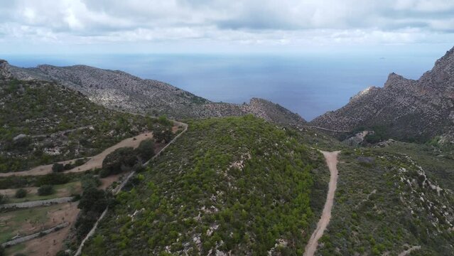 Scenic drone footage of the Coll de Sa Gramola, Mallorca. Fascinating aerial views of landscape, mountains, rocks and seaside.