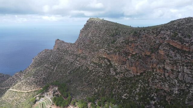 Scenic drone footage of the Coll de Sa Gramola, Mallorca. Fascinating aerial views of landscape, mountains, rocks and seaside.