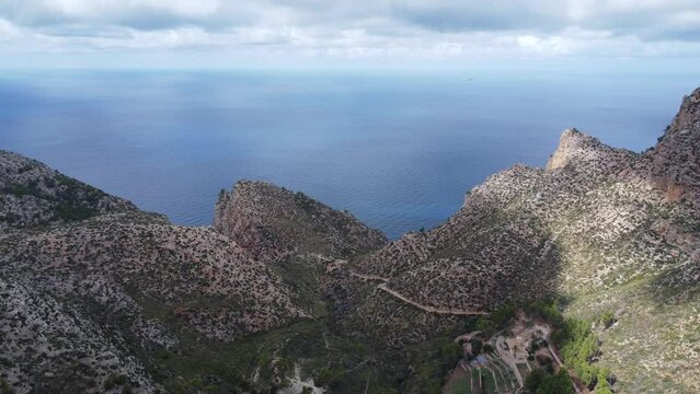 Scenic drone footage of the Coll de Sa Gramola, Mallorca. Fascinating aerial views of landscape, mountains, rocks and seaside.