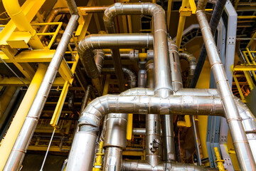 Heating medium oil pipeline protected with stainless steel insulation for keep temperature form environment, offshore oil and gas central processing platform piping system.