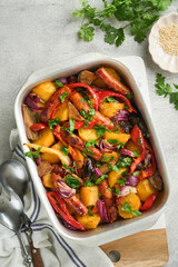 Baked sausage and vegetables, peppers, zucchini, tomatoes, red onion and eggplant with sesame and...
