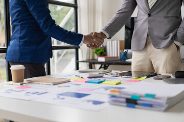 Business handshake for teamwork of business mergers and acquisitions. Successful negotiations,...