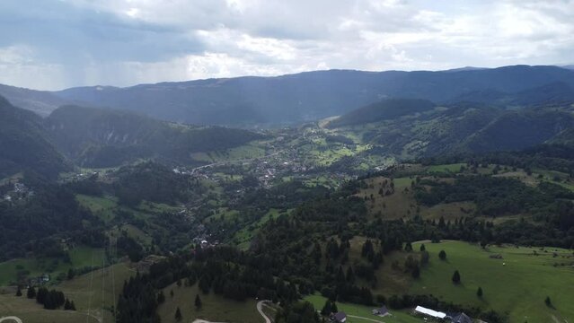 Scenic drone footage of Bran, Transylvania, Romania. Fascinating aerial views of landscape, mountains and castle.